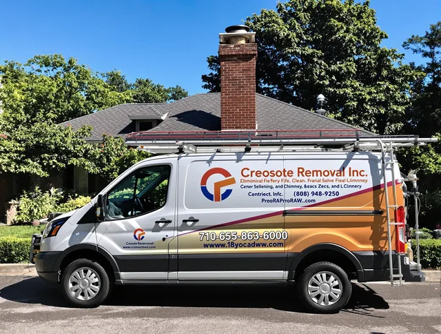 Hinesville Chimney Sweep technician removing creosote safely in Hinesville, GA