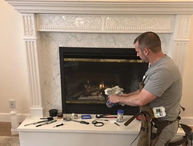 Hinesville Chimney Sweep performing fireplace maintenance in Hinesville, GA